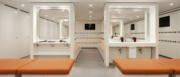 Brightly lit changing area in the JJ Mack Building, London