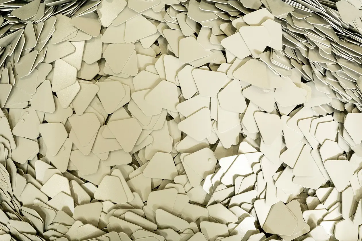 Trapezoid-shaped stamping waste