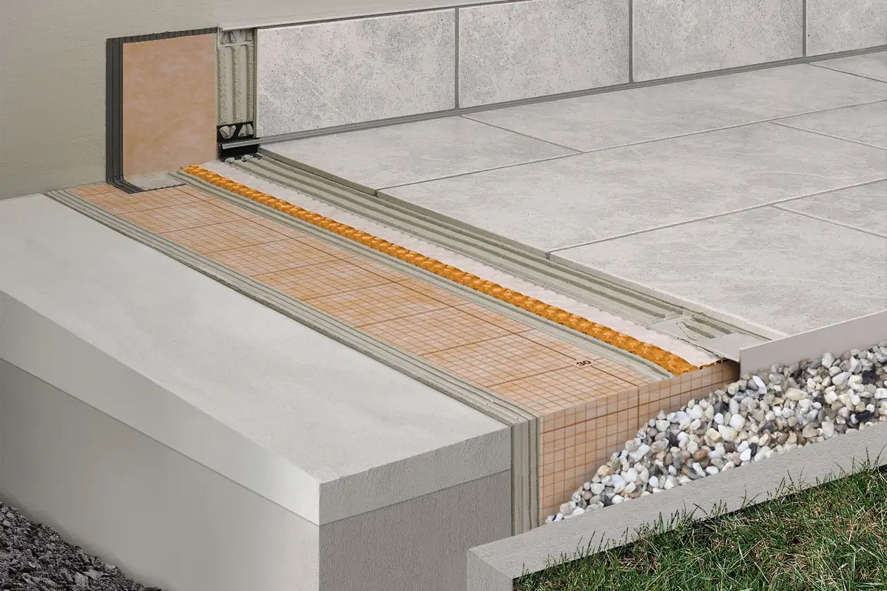 Schl&uuml;ter-Systems terrace assembly B.2 with DITRA-DRAIN for bonded drainage and bonded uncoupling over KERDI bonded waterproofing