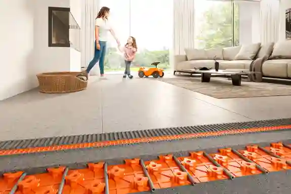 Floor construction in the living room with water-based Schlüter-BEKOTEC-THERM floor heating system.