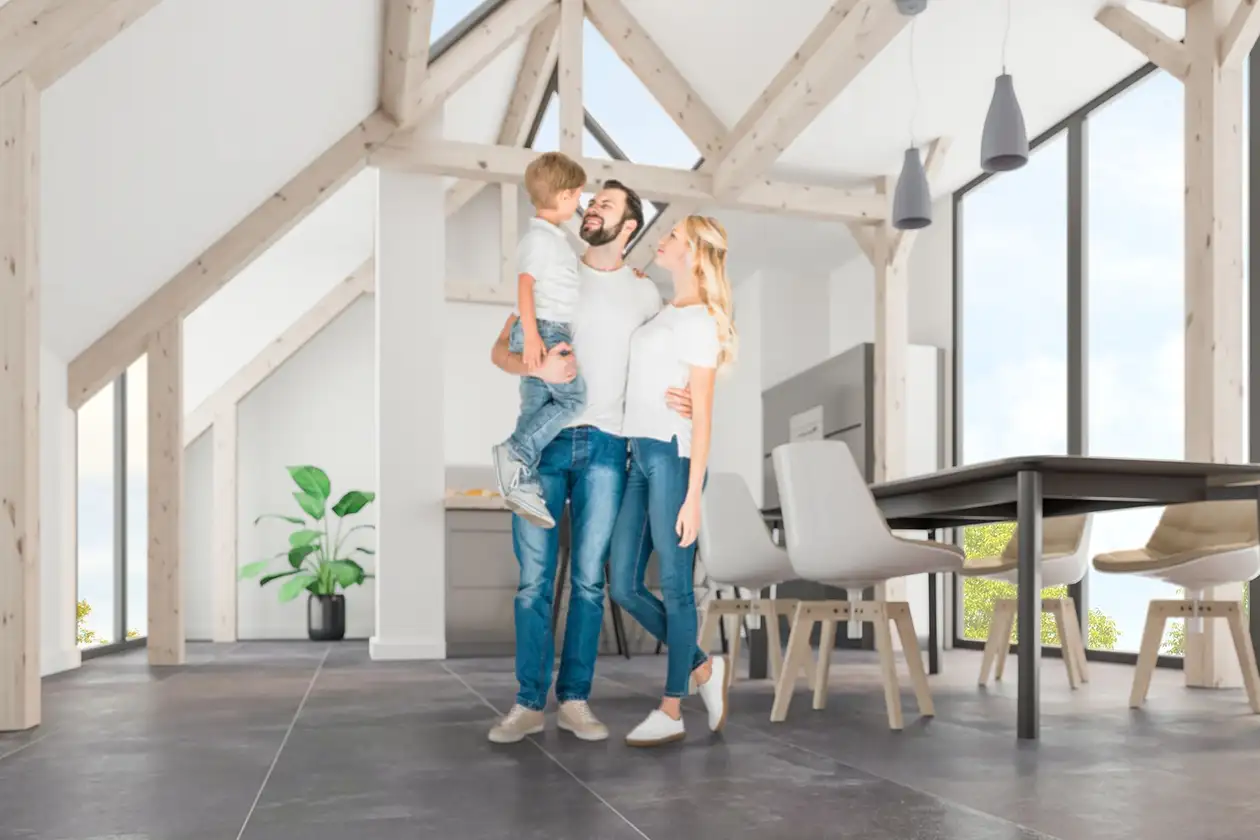 Young couple, man carrying a child in his arms, in a tiled rooftop apartment