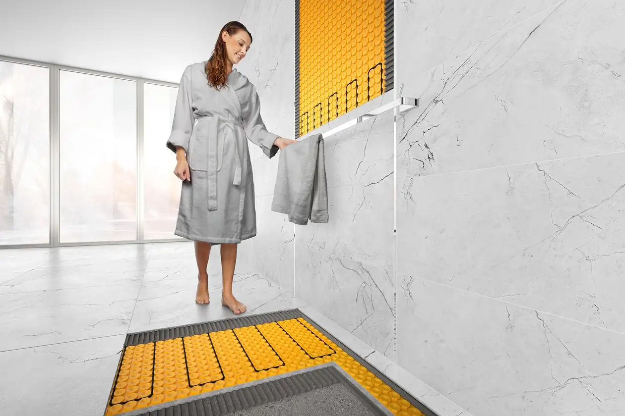 DITRA-HEAT-E electric radiant panel heating system installed on walls and floors,