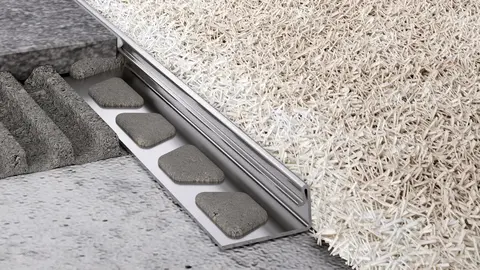 Floor construction in a living room with a Schlüter-SCHIENE as finishing edge.