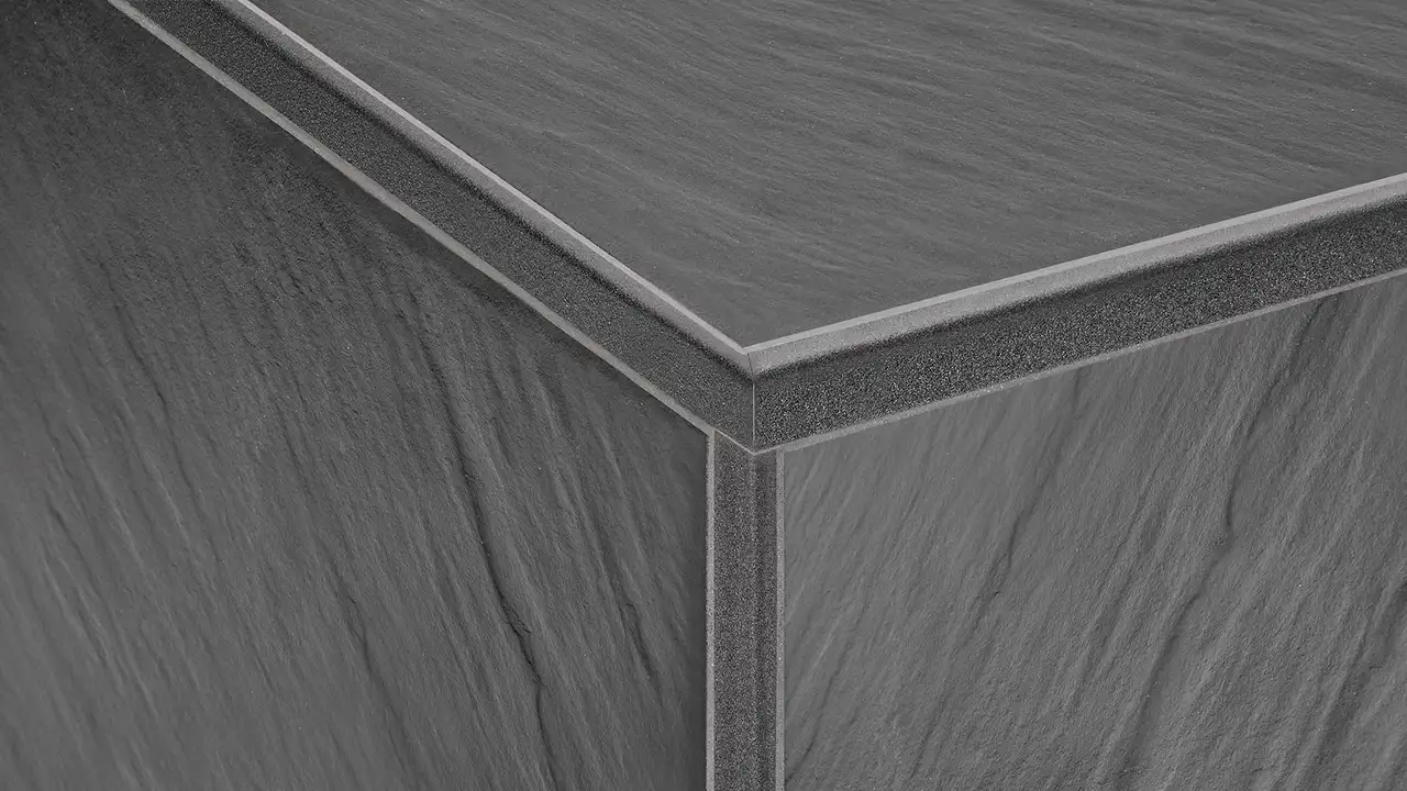 Schlüter-Systems structure-coated TRENDLINE tile corner in TSDA dark anthracite