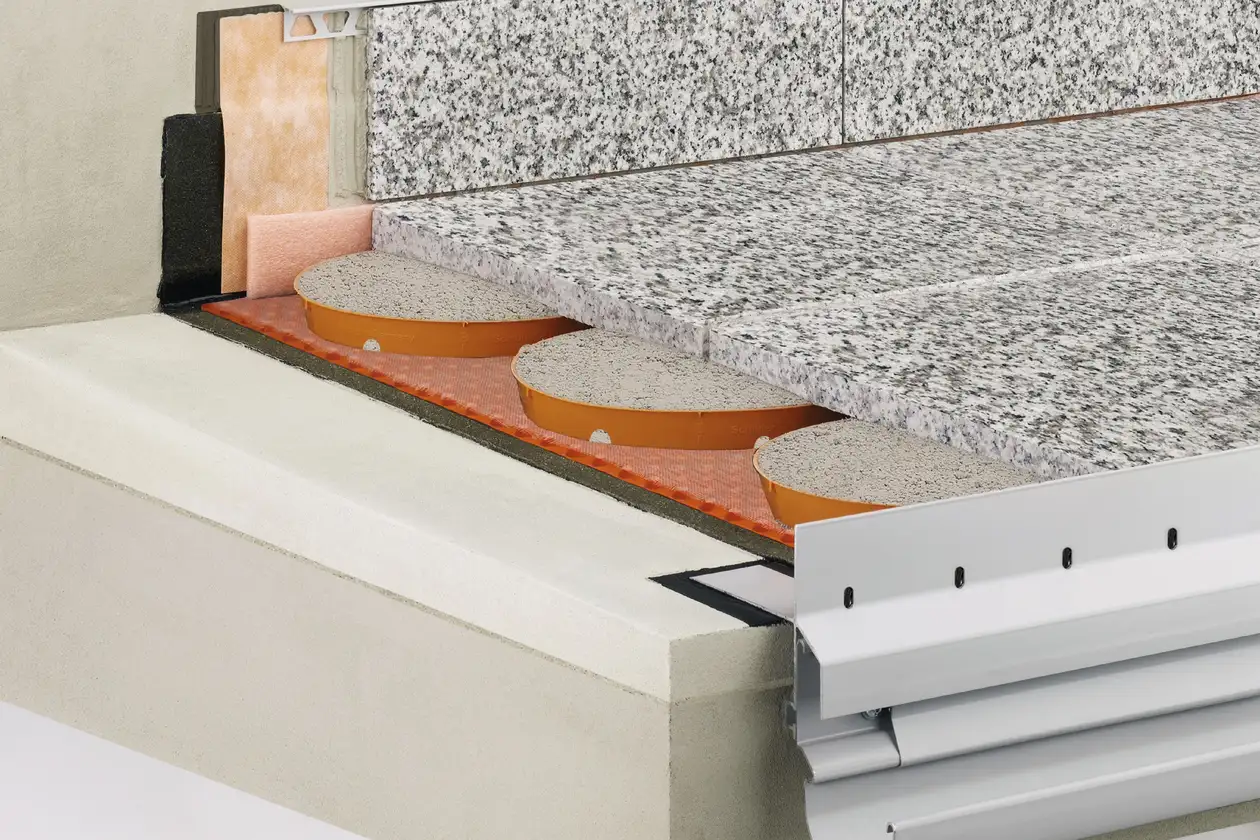 Schl&uuml;ter-Systems balcony assembly A.7 Covering assembly with TROBA-STELZ mortar rings