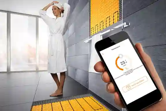 With the Schlüter-Systems HEAT-CONTROL app for DITRA-HEAT-E, heatable bathroom areas in floors and walls can be controlled from a mobile phone.