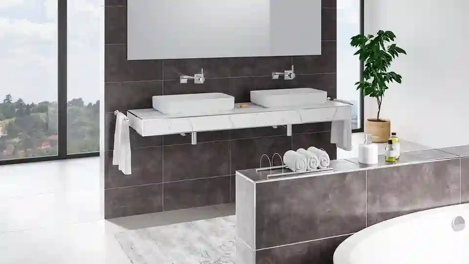 Mit Schlüter-JOLLY-Abschlussprofilen werden die Fliesenkanten des gefliesten Waschtisches und der Vorwandinstallation in einem modernen Badezimmer geschützt und gleichzeitig dekorativ gestaltet.