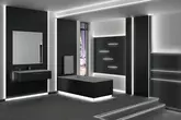 Salle de bains carrel&eacute;e de noir avec des accents lumineux aux murs, au plafond, sur le rebord de la baignoire et sur les plinthes