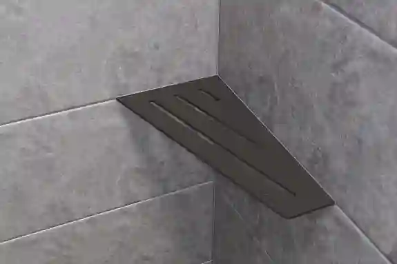 Schlüter-SHELF-E-S3 is a long, rectangular corner shelf for shower areas