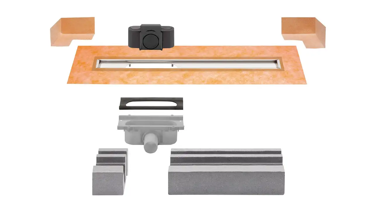KERDI-LINE-G3 (outlet offset left) set components including KERDI waterproofing, water trap/seal, drain body, polystyrene channel support and drainage channel