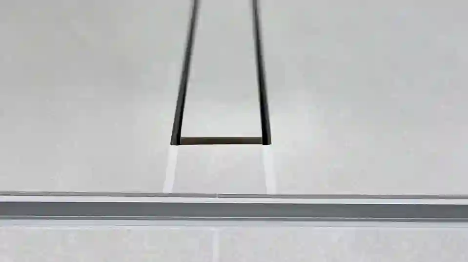 Side on close up of a linear floor drain