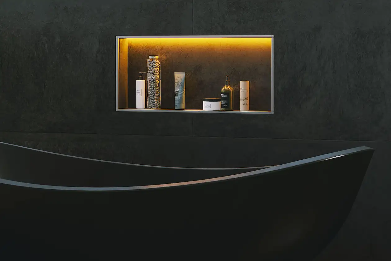 Bagno scuro con vasca e nicchia a parete illuminata Schlüter-KERDI-BOARD-NLT.