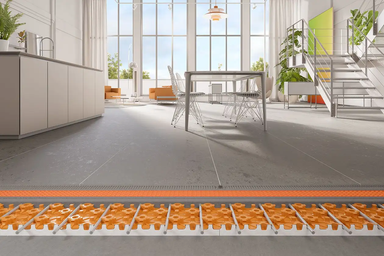 Modernt, ljust vardagsrum med Schl&uuml;ter-BEKOTEC-THERM tv&auml;rsektion i f&ouml;rgrunden
