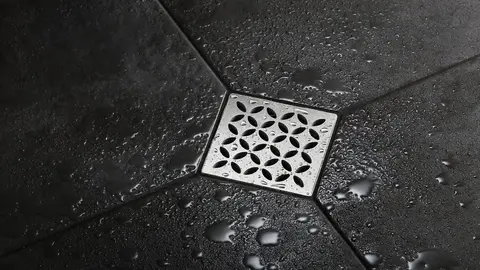 Schl&uuml;ter-KERDI-DRAIN-STYLE &auml;r designsilar av borstat rostfritt st&aring;l f&ouml;r golvbrunnsl&ouml;sningar i serien Schl&uuml;ter-KERDI-DRAIN
